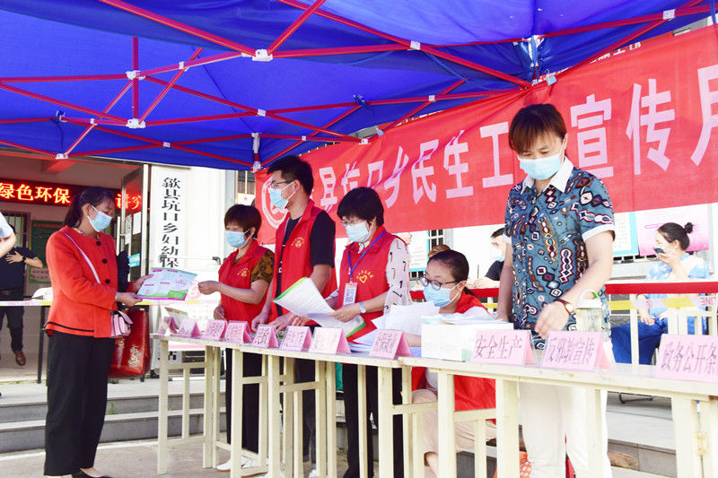 歙县坑口乡：“志愿红”点燃民生政策宣传热